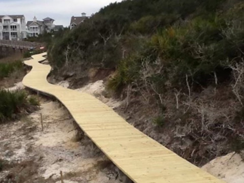 new deck pathway along the sand built and installed by Shoreman's Marine in Rosemary Beach